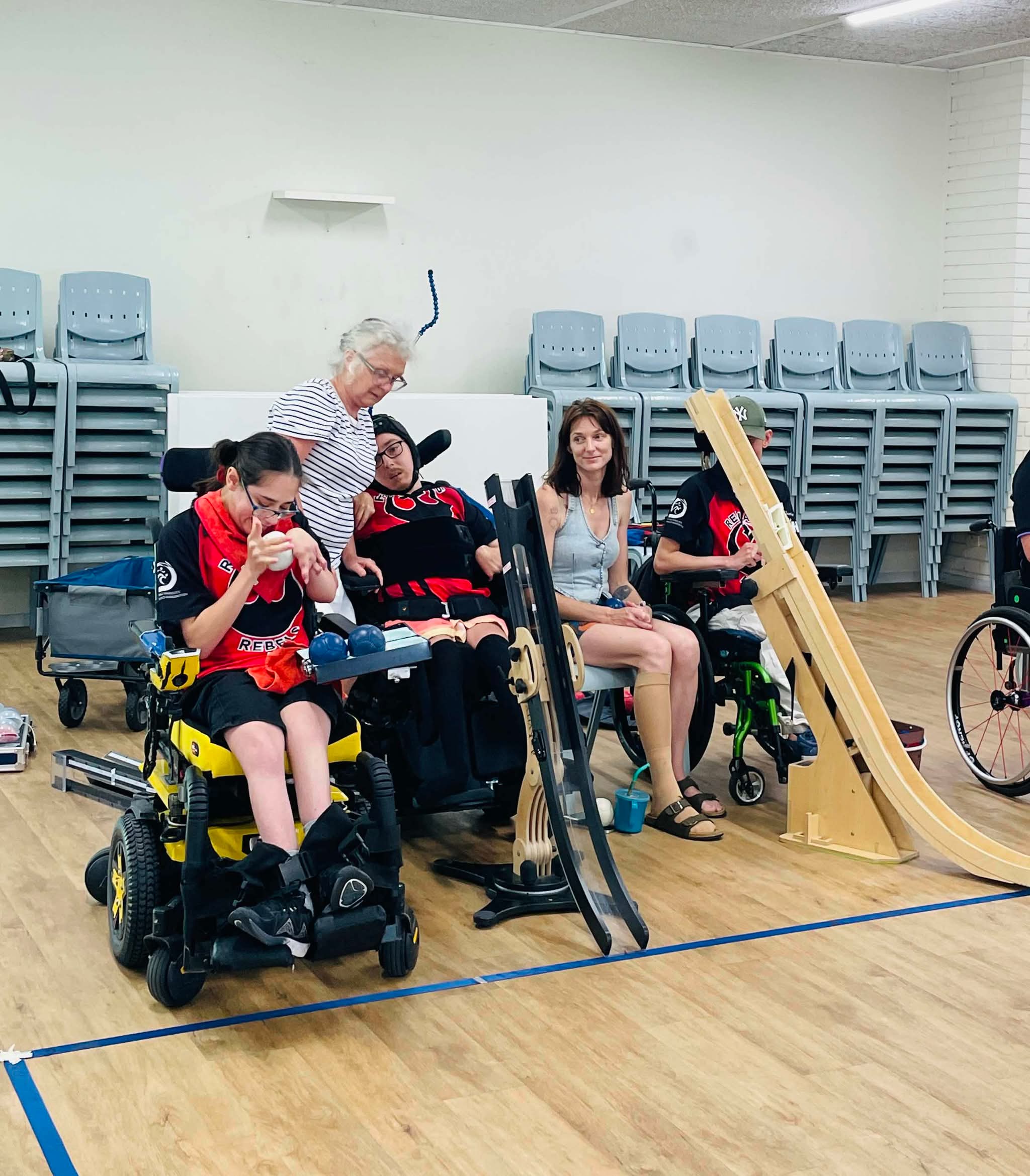 Players using a boccia ramp during a Sunday session